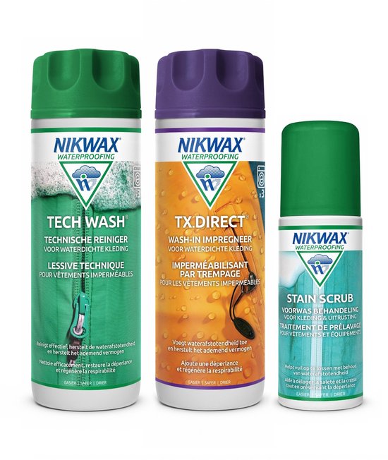 Drie flessen Nikwax: Tech Wash groen, Tx.Direct paars en Stain Scrub groen met witte en blauwe logo's.