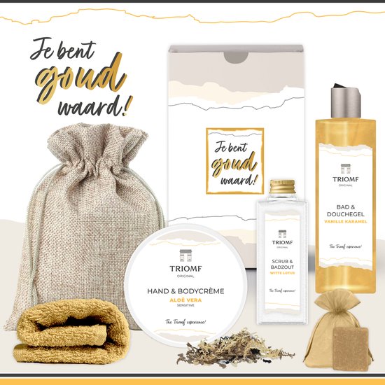 Geschenkset met een beige linnen tas, gele handdoek, crème, scrub, bad & douchegel, en zeep. Tekst: 'Je bent goud waard!'
