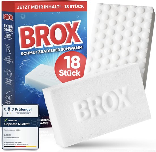 Witte Brox schuursponsjes in de verpakking en los, met het opschrift 'BROX SCHMUTZRADIERER SCHWAMM'.