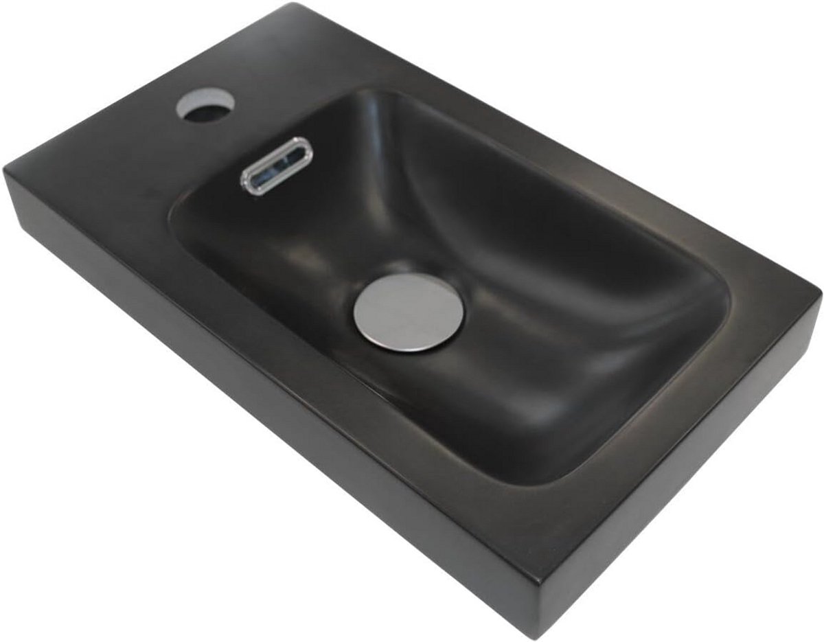 Kleine zwarte wastafel van hars voor badkamer of toilet