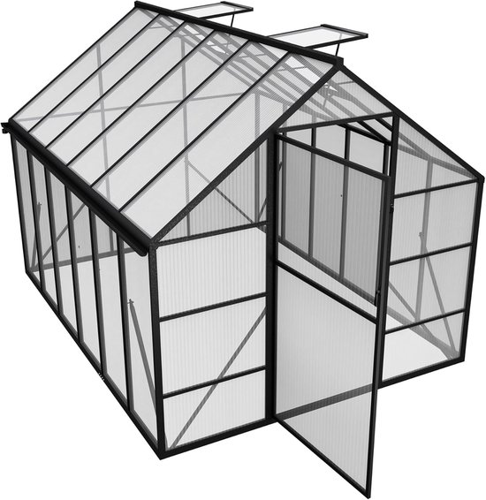 Une serre spacieuse avec cadre en aluminium noir et plaques de polycarbonate transparentes. Les portes et lucarnes sont ouvertes.
