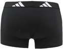 Zwarte boxer met zwarte band met witte Adidas logo's.