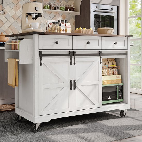 Meuble de cuisine blanc avec plateau en bois, rempli d'ustensiles de cuisine, dans un environnement de cuisine.