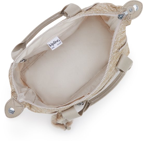 Open beige Kipling ART MINI damestas met goudkleurige spikkelprint en beige stoffen voering.