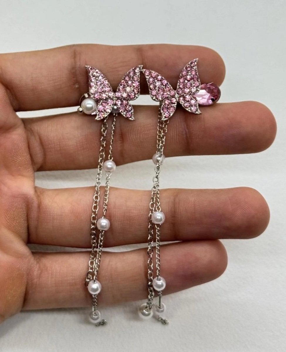 Oorbellen met rose vlinders en kettinkjes | Oorbellen | Vlinders | Butterflies