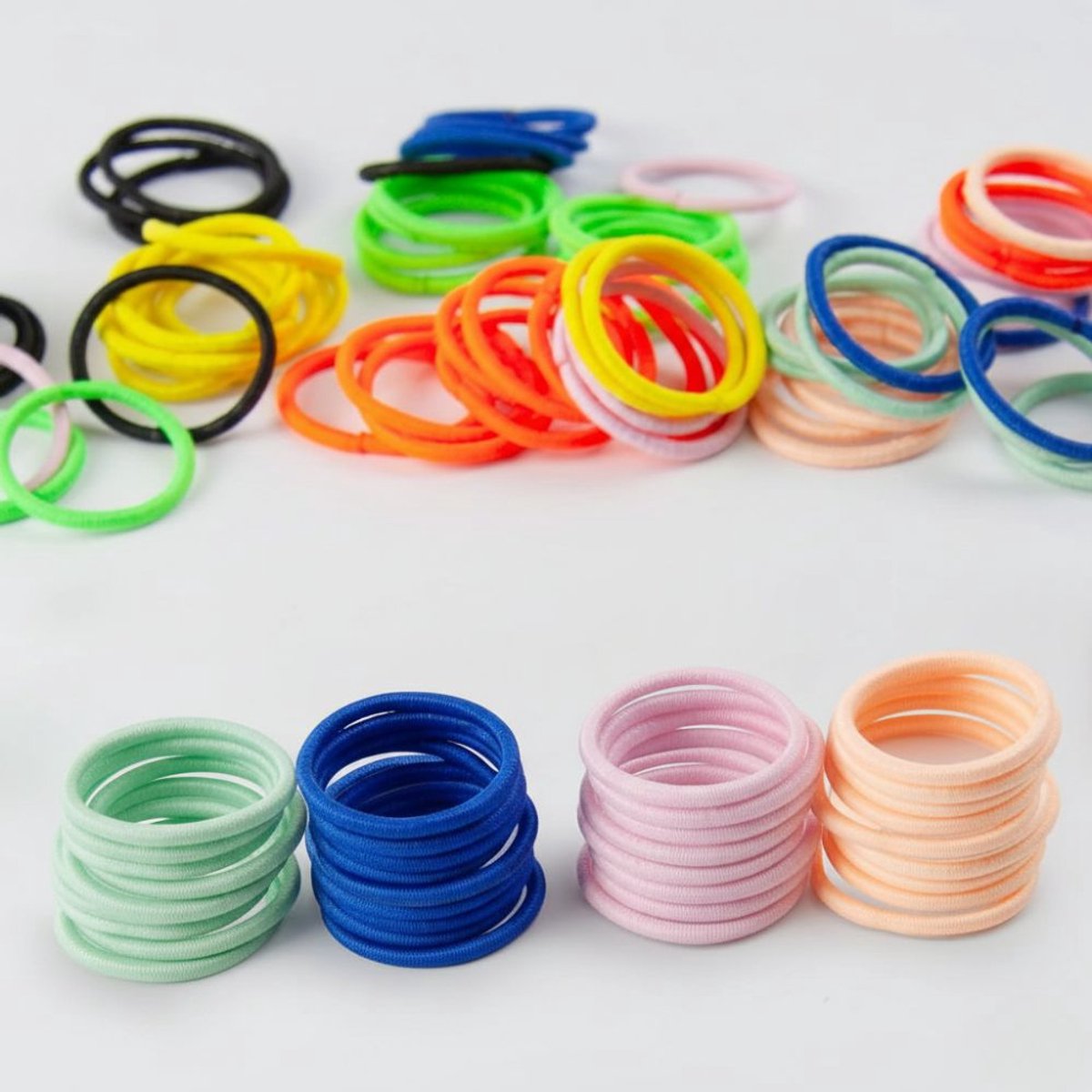 Famanu - 100 Stuks Mini elastiekjes voor ’s/peuters, 2 mm, 10 gemengde kleuren