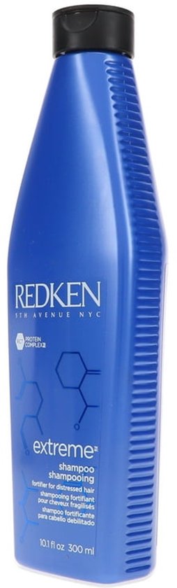 Bouteille bleue de shampoing Redken Extreme avec côtés côtelés et texte blanc, 300 ml.