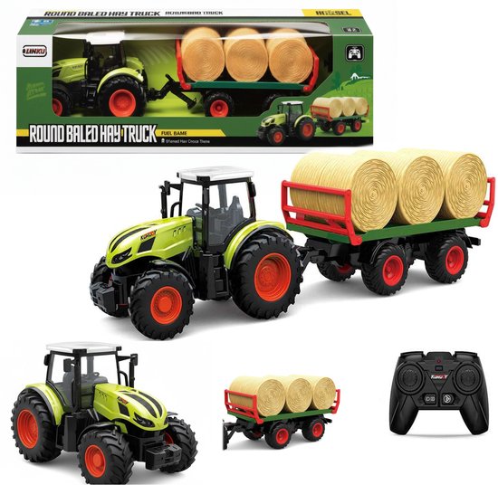 Tracteur vert clair avec remorque, balles de foin et télécommande.