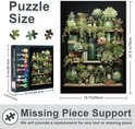 Afmetingen van een 1000-delige puzzel van 50x70cm met groene planten, getoond met de doos en enkele losse stukjes.