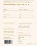 Achterkant van een beige zak met "Zuvéra Colostrum". Toont voedingsinformatie en ingrediëntenlijst.