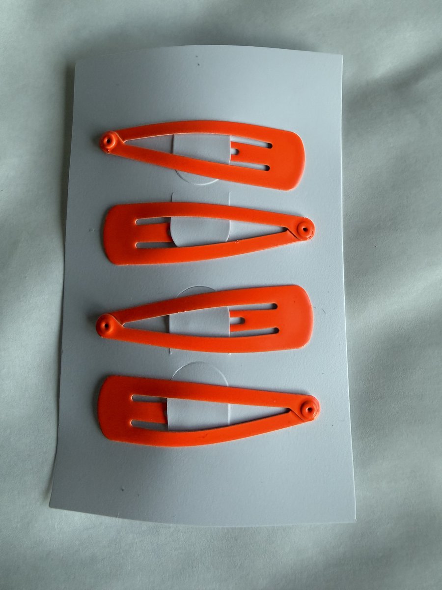 Neon oranje klik klak speldjes 4 stuks - koningsdag - haar accessoire - feest - voetbal - ek - wk - nederland