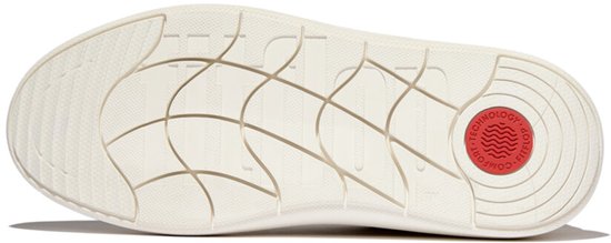 Crèmekleurige sneakerzool met antislip profiel en rode cirkel.