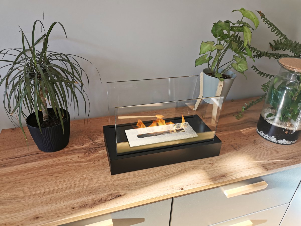 Luxe bio-ethanol sfeerhaard in Glow Zwart – geschikt voor binnen- en buitengebruik – rookvrij en stijlvol design.
