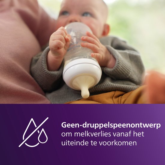 Baby drinkt uit Avent fles met anti-druppel spenenontwerp, voorkomt melkverlies.