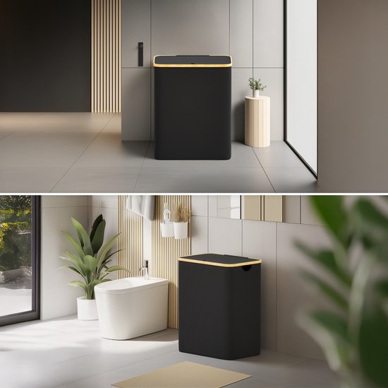 Zwarte wasmand van 160L met gouden accenten en een deksel, staat in een moderne badkamer.