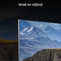 CHiQ TV met een berglandschap op het scherm. Tekst: 'Strak en stijlvol'.