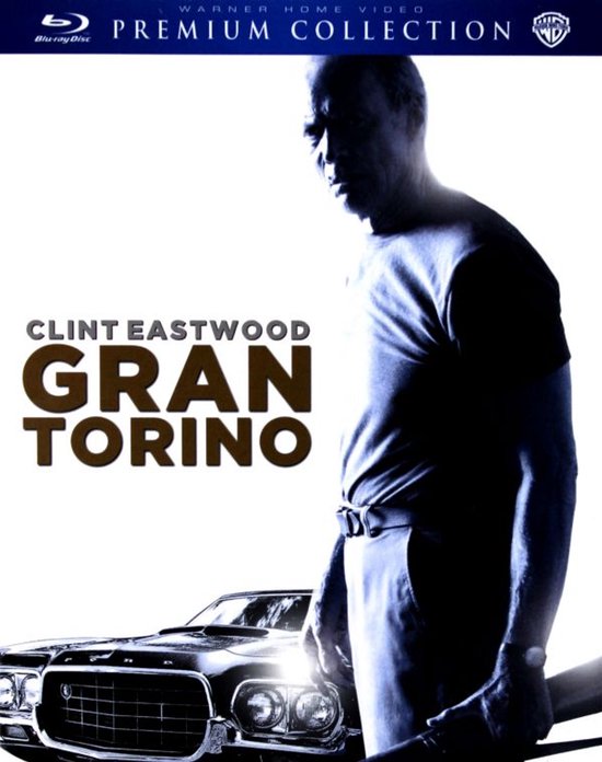 Clint Eastwood in Gran Torino, met een auto op de voorgrond.