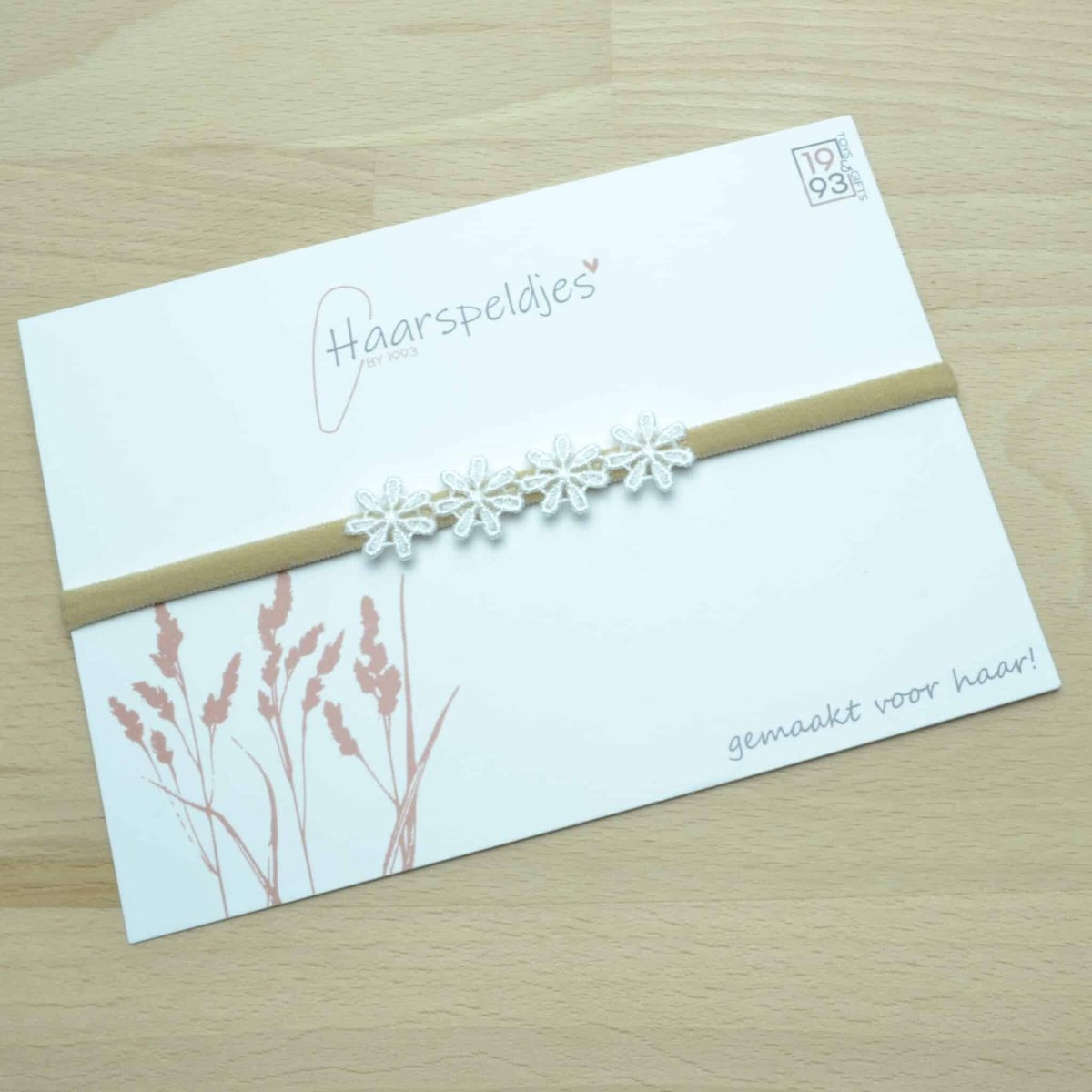 Elastieken haarbandje Lauren by 1993 - 4 witte bloemetjes - haaraccessoires