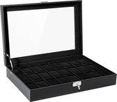 Zwarte horlogebox met 24 vakken en glazen deksel, open en leeg, met een slot.