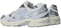 Witte en zilverkleurige Asics Gel-1130 sneakers van mesh en synthetisch materiaal met crèmekleurige zool.