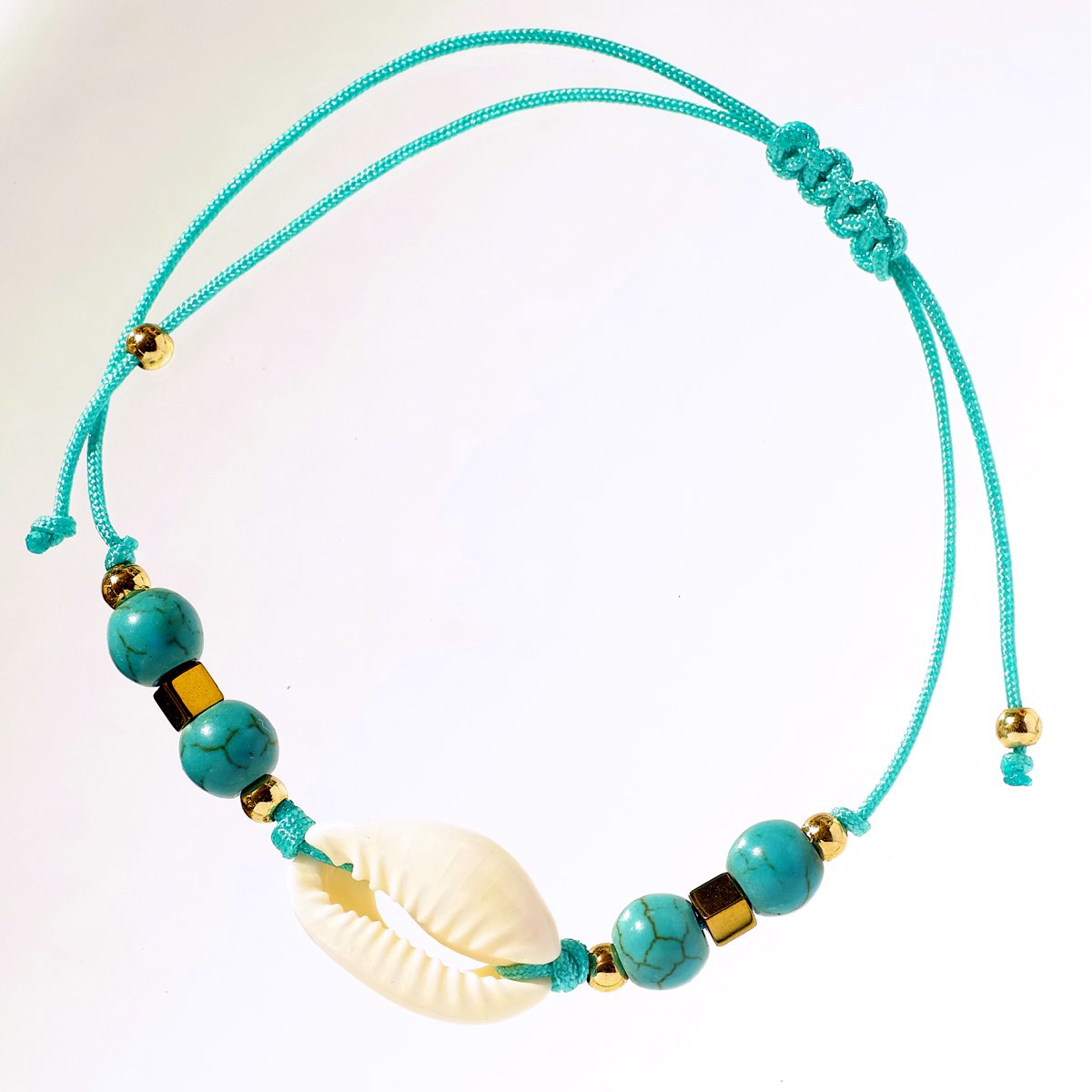 Aquablauwe kauri armband met gouden accenten