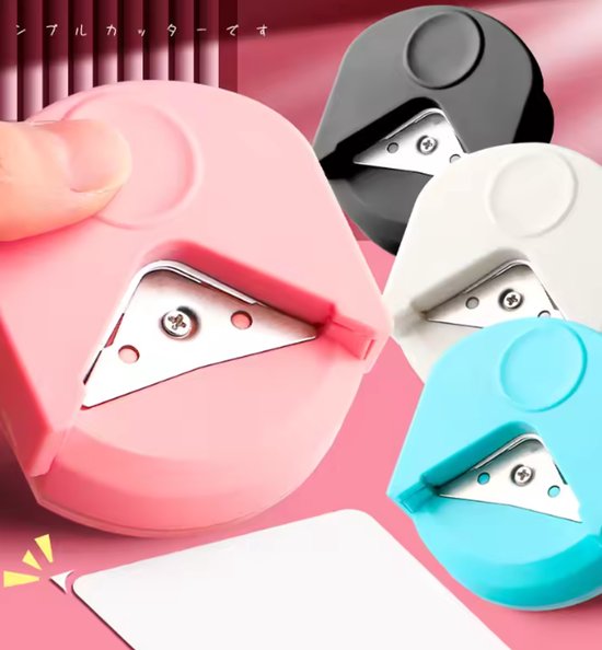 Vier hoekponsmachines in roze, zwart, wit en blauw, die papieren hoeken afronden.