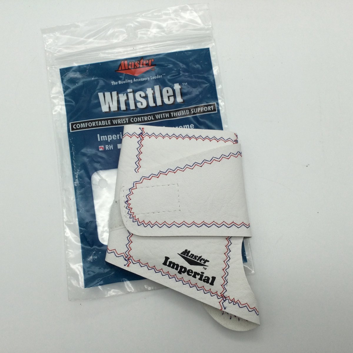 Bowling Bowlingwristlet, 'Master Wristlet Imperial' kleur wit, simpele ondersteuning voor de pols, one size fits all, met klittebandsluiting. Voor rechtshandige bowler