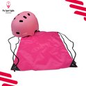 Casque PRO SPORT LIGHTS rose avec un sac à cordon rose.