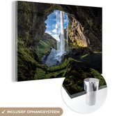 MuchoWow® Glasschilderij 60x40 cm - Schilderij acrylglas - Waterval buiten een grot in IJsland - Foto op glas - Schilderijen