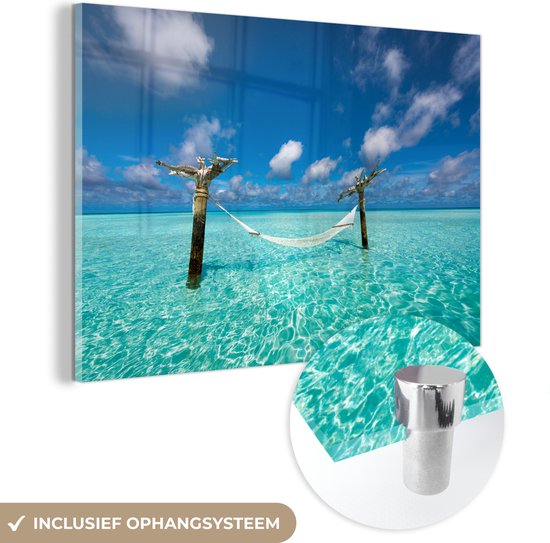 MuchoWow® Glasschilderij 90x60 cm - Schilderij acrylglas - Zee - Hangmat - Lucht - Foto op glas - Schilderijen