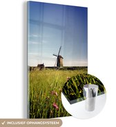 MuchoWow® Glasschilderij 20x30 cm - Schilderij acrylglas - Een molen met bloemen - Foto op glas - Schilderijen