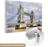 MuchoWow® Glasschilderij 150x100 cm - Schilderij acrylglas - Uitzicht op de Tower Bridge in London - Foto op glas - Schilderijen