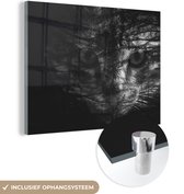 MuchoWow® Glasschilderij 80x60 cm - Schilderij acrylglas - Kat - Bos - Zwart - Wit - Foto op glas - Schilderijen