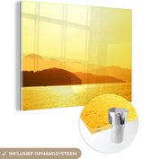 MuchoWow® Glasschilderij 80x60 cm - Schilderij acrylglas - Zonsondergang bij het strand - Foto op glas - Schilderijen