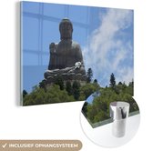 MuchoWow® Glasschilderij 150x100 cm - Schilderij acrylglas - De Tian Tan Boeddha in Honkong - Foto op glas - Schilderijen