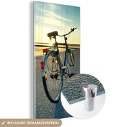 MuchoWow® Glasschilderij 60x120 cm - Schilderij acrylglas - Noordzee - Fiets - Zonsondergang - Foto op glas - Schilderijen