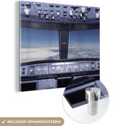 MuchoWow® Glasschilderij 20x20 cm - Schilderij acrylglas - Cockpit - Wolken - Vliegtuig - Foto op glas - Schilderijen