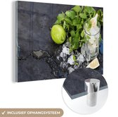 MuchoWow® Glasschilderij 120x80 cm - Schilderij acrylglas - Cocktail - Mojito - Ijsblokjes - Foto op glas - Schilderijen