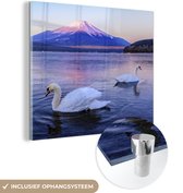 MuchoWow® Glasschilderij 50x50 cm - Schilderij acrylglas - Zwanen - Water - Berg - Foto op glas - Schilderijen