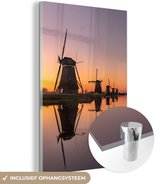 Coucher de soleil coloré aux célèbres moulins à vent de Kinderdijk en Europe Plexiglas 40x60 cm - Tirage photo sur Glas (décoration murale en plexiglas)