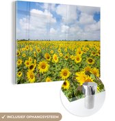 MuchoWow® Glasschilderij 40x30 cm - Schilderij acrylglas - Zonnebloemen - Bloemen - Wolken - Natuur - Geel - Landschap - Foto op glas - Schilderijen