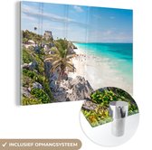 MuchoWow® Glasschilderij 150x100 cm - Schilderij acrylglas - Uitzicht op het strand van Tulum in Mexico - Foto op glas - Schilderijen