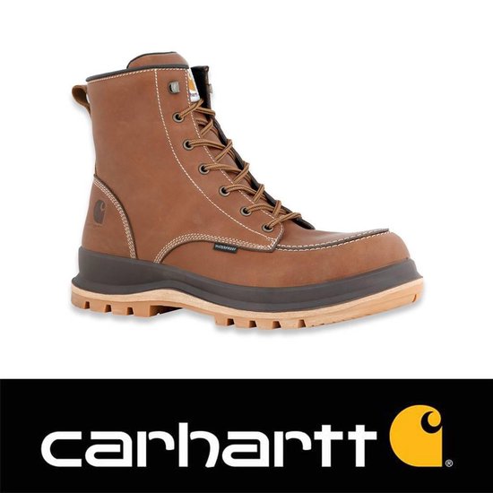 Bruine leren werklaars met vetersluiting, witte stiksels en een donkerbruine zool. Carhartt logo op de zijkant.