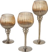 Luxe glazen design kaarsenhouders/windlichten set van 3x stuks brons metallic transparant met formaat tussen de 20 en 30 cm