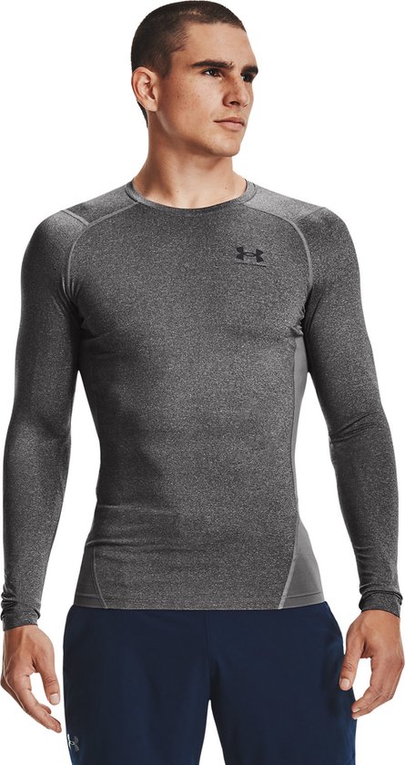 Grijs gemêleerde Under Armour tight fit longsleeve met zwart Under Armour logo op de borst.