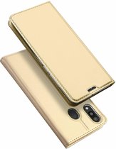 Hoesje geschikt voor Samsung Galaxy M20 Plusje - dux ducis skin pro book case - goud