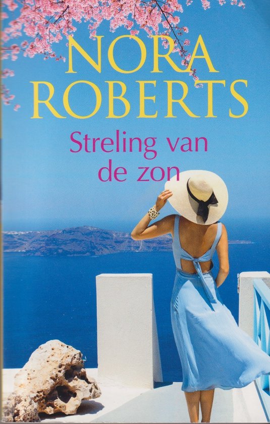 Een vrouw in een blauwe jurk met een strooien hoed kijkt uit over een blauwe zee met eilanden, onder een tak met roze bloesems. Titel: Streling van de zon.