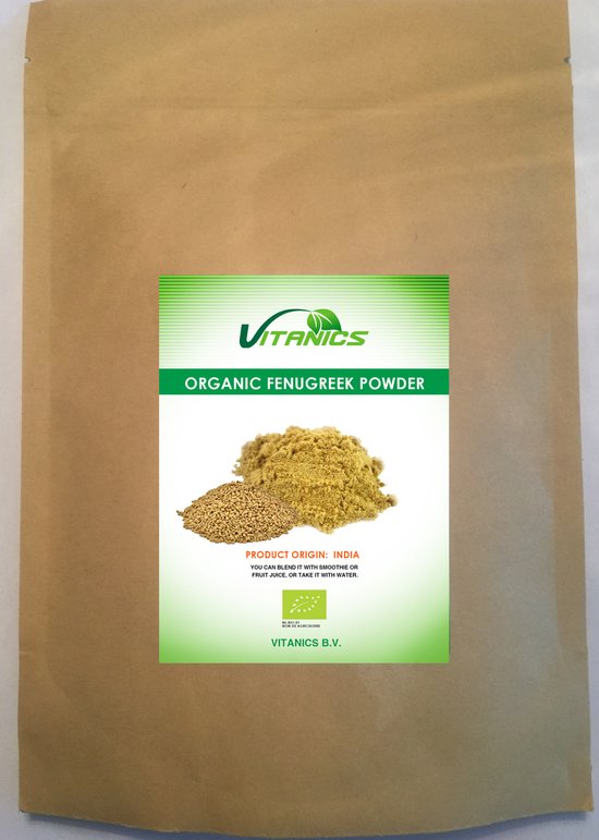 Een pak met Vitanics biologisch fenegriekpoeder. Het pak bevat een label met een afbeelding van fenegriekzaad en poeder. PRODUCT ORIGIN: INDIA.