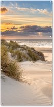 Wanddecoratie buiten Strand - Duin - Gras - Zonsondergang - Zee - 80x160 cm - Tuindoek - Buitenposter Wanddecoratie buiten Strand - Duin - Gras - Zonsondergang - Zee - 80x160 cm