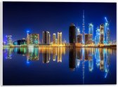 PVC Schuimplaat- Skyline van Dubai met Weerspiegeling in de Zee, Qatar - 40x30 cm Foto op PVC Schuimplaat